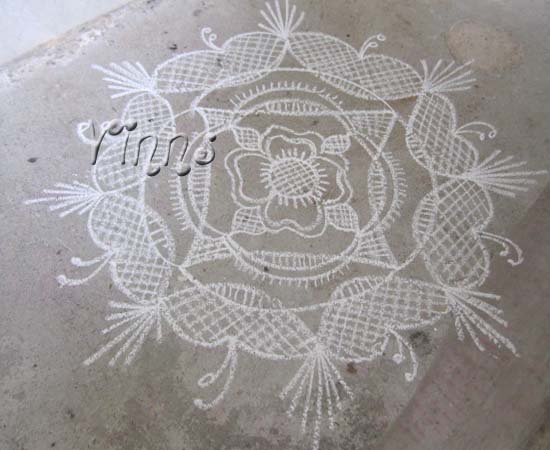 Freestyle freehand flower rangoli