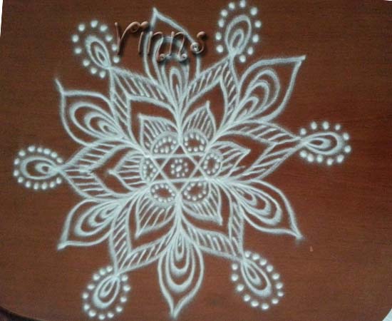 Star freehand kolam without dots